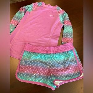 Kids medium O’Rageous swim shorts and matching swim shirt